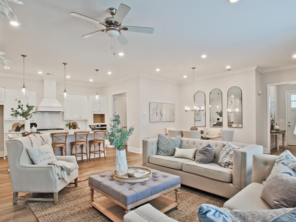 197 Redford Lane Canton, GA 30115 - Photo 1 of 1 a living room with furniture kitchen view and a chandelier