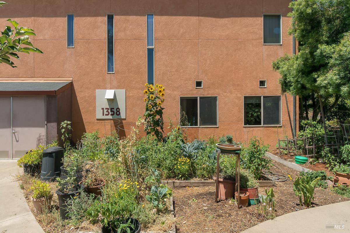 1354 Yulupa Avenue, Unit E Santa Rosa, CA 95405 - Photo 24 of 24 a front view of a house with plants