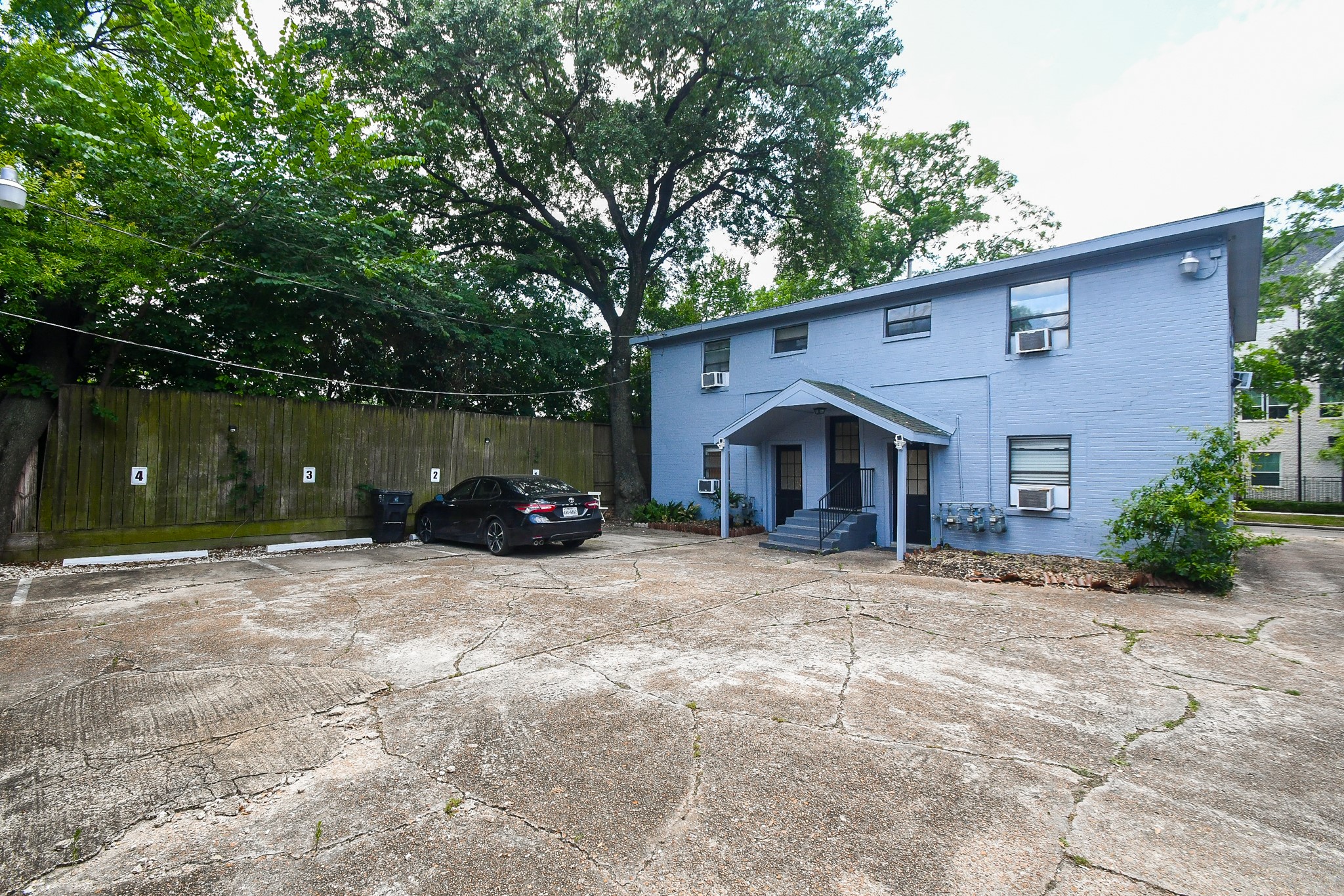 4623 Yupon Street, Unit 3 Houston, TX 77006 - Photo 16 of 18 a view of a house with a yard