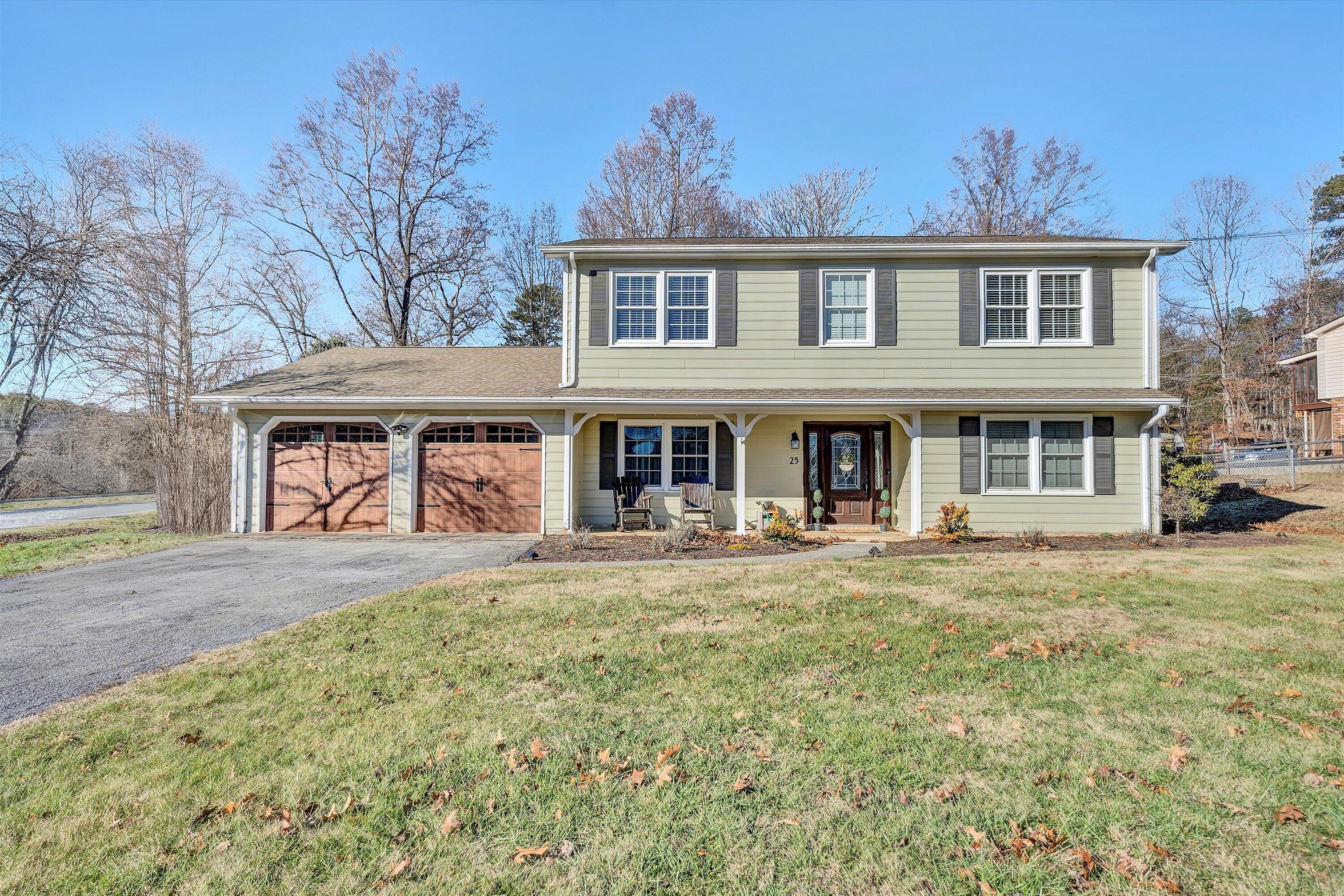 25 Charmwood Drive Blue Ridge, VA 24064 - Photo 1 of 35 front view of a brick house with a yard