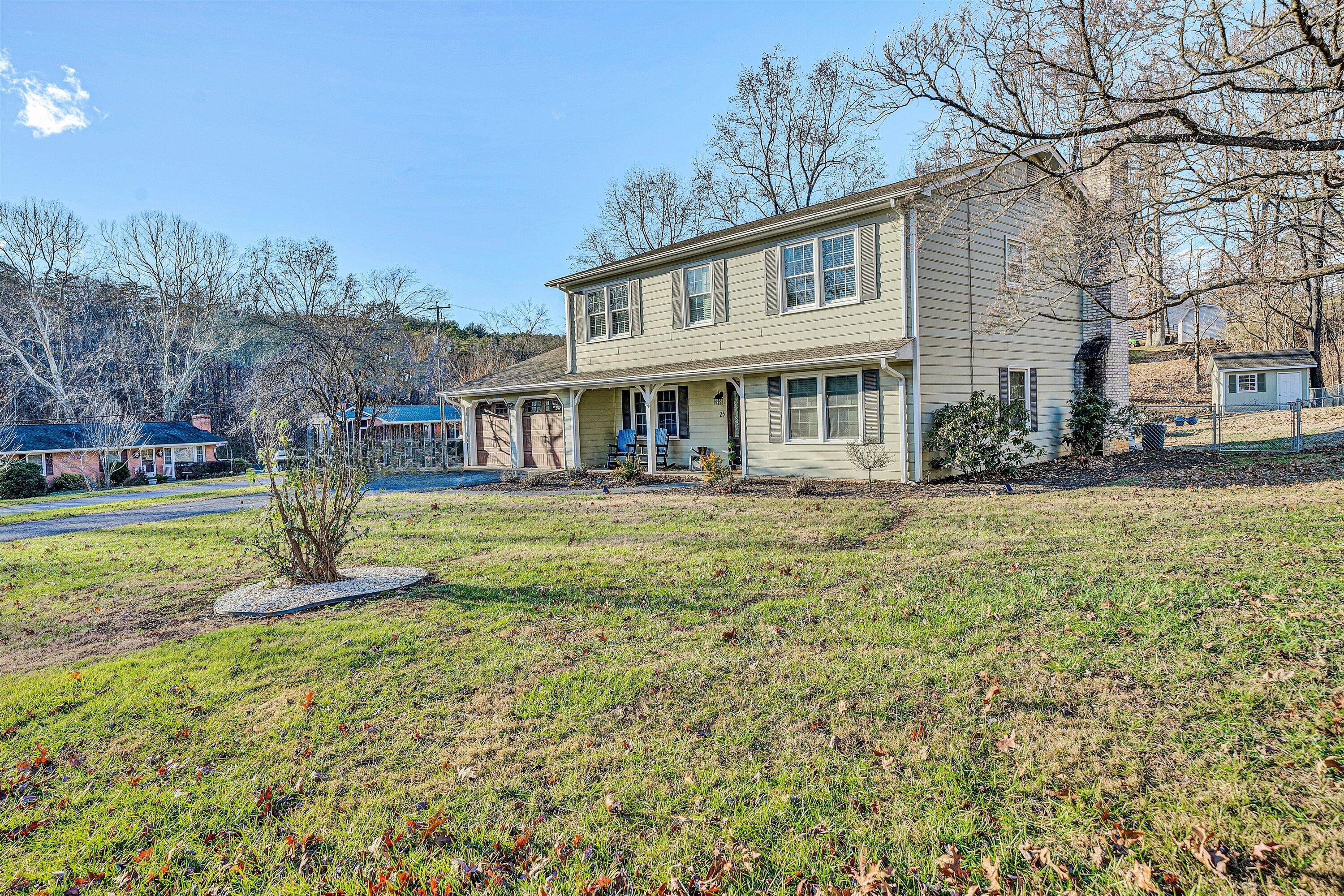 25 Charmwood Drive Blue Ridge, VA 24064 - Photo 2 of 35 a front view of a house with a yard