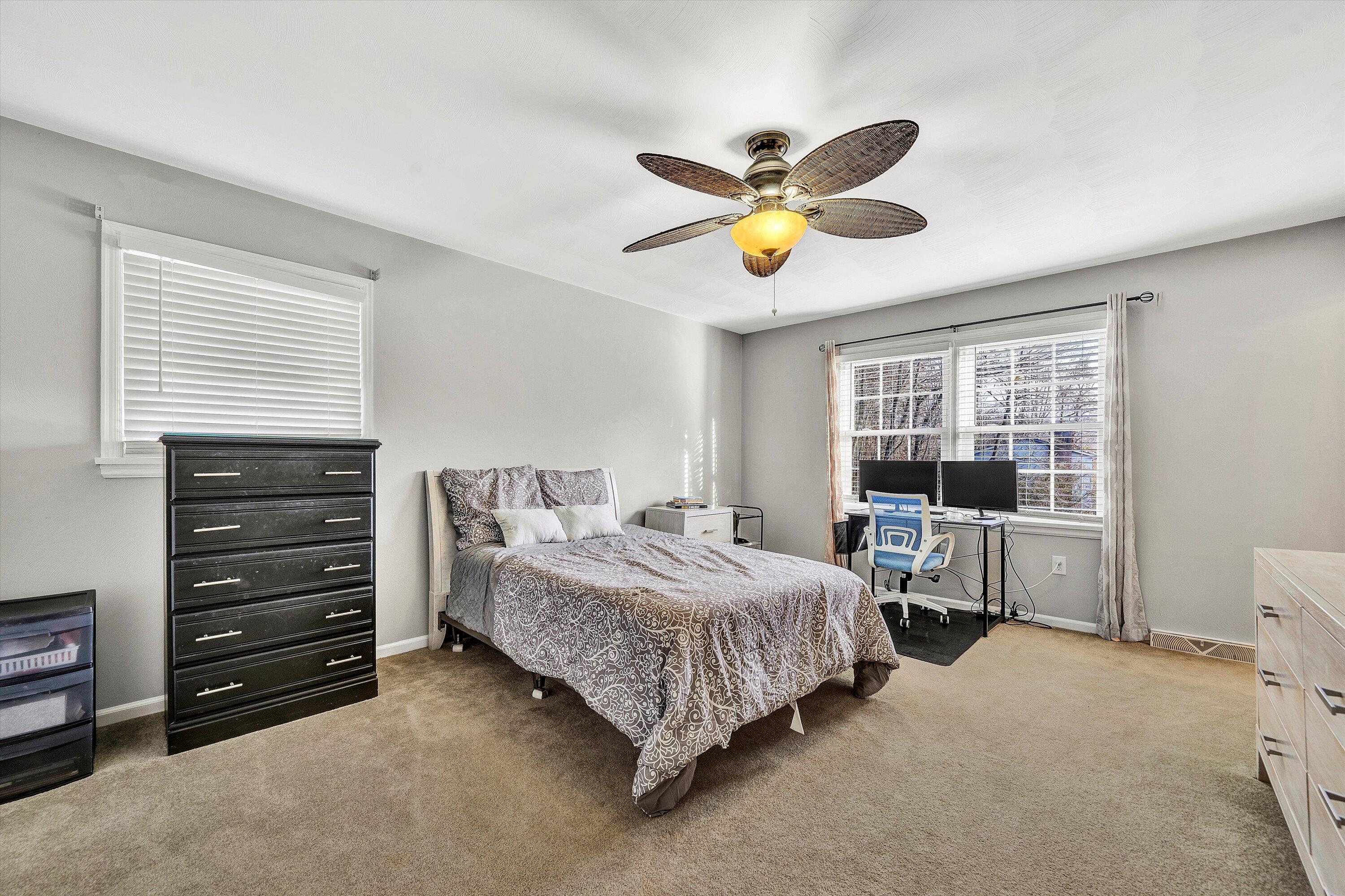 25 Charmwood Drive Blue Ridge, VA 24064 - Photo 24 of 35 a bedroom with a bed and a window