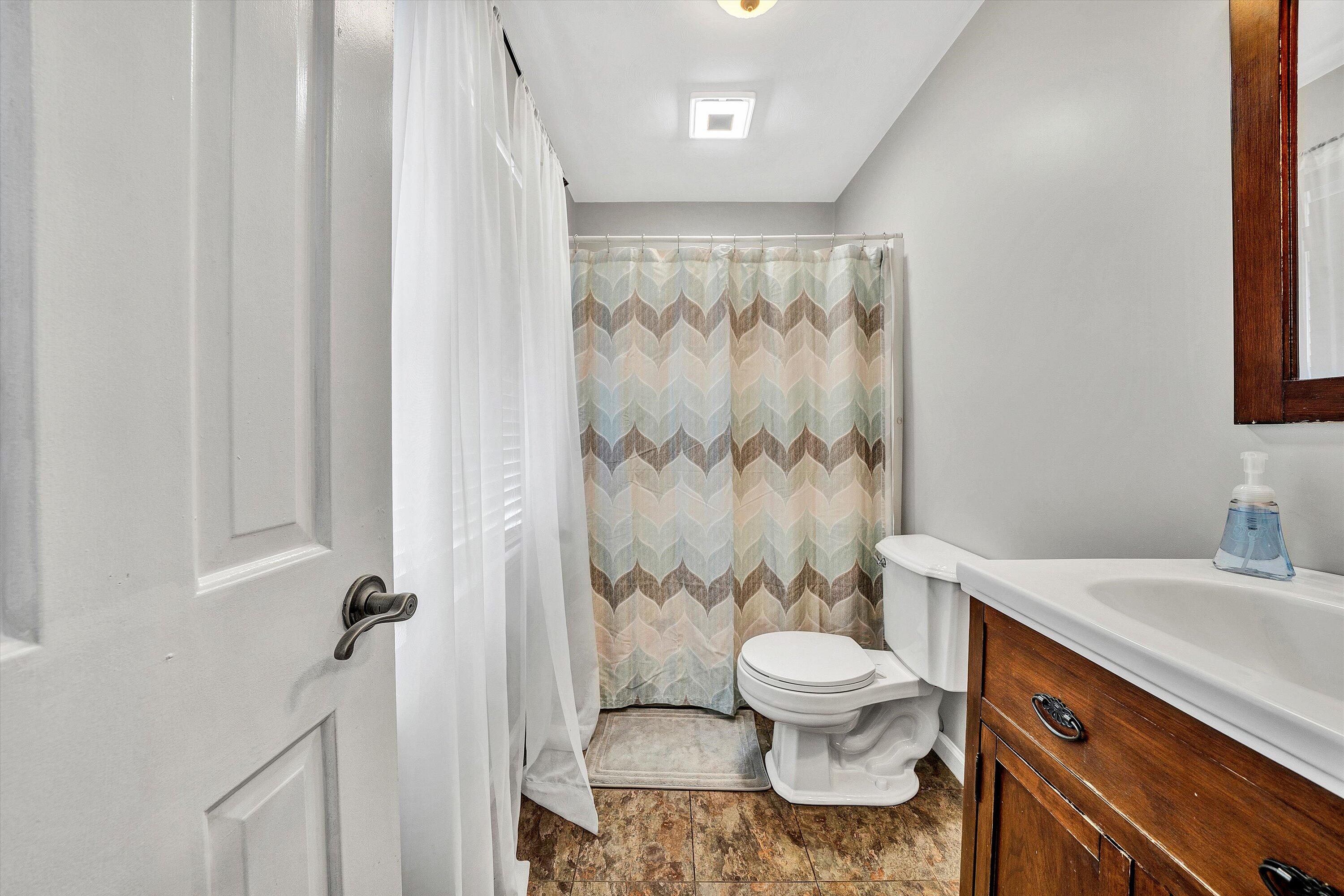 25 Charmwood Drive Blue Ridge, VA 24064 - Photo 25 of 35 a bathroom with a granite countertop sink toilet and shower