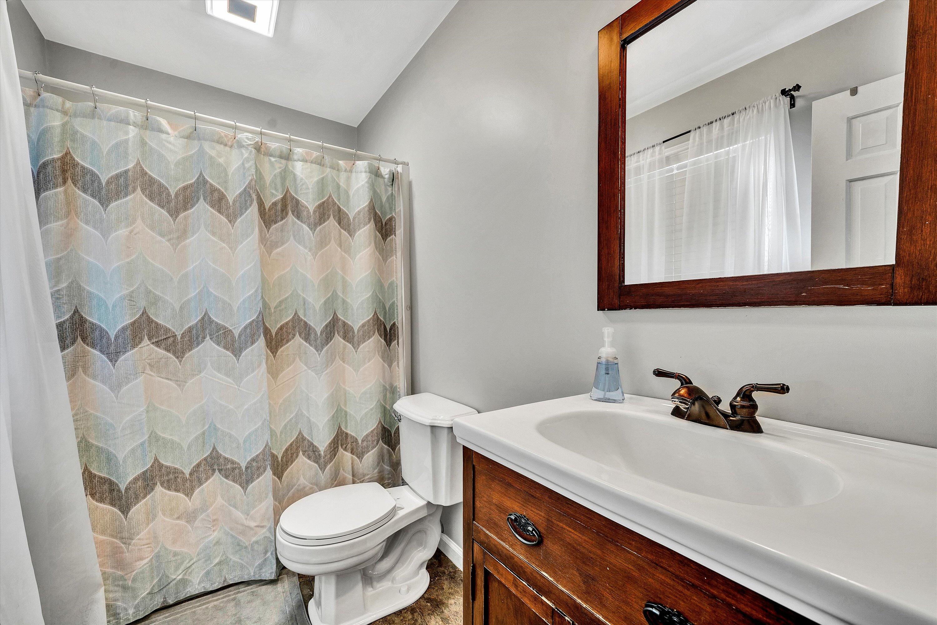 25 Charmwood Drive Blue Ridge, VA 24064 - Photo 26 of 35 a bathroom with a sink and a mirror