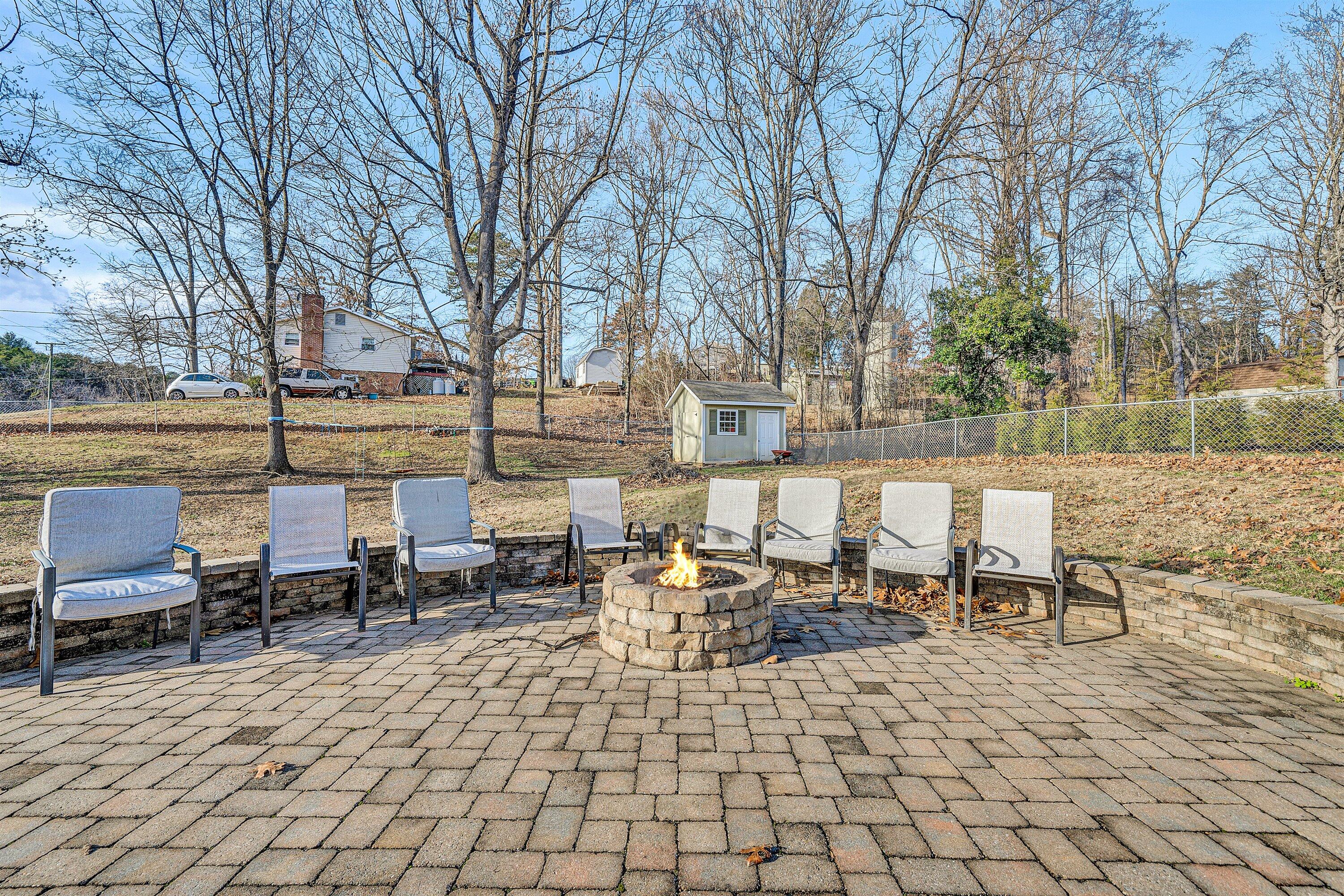 25 Charmwood Drive Blue Ridge, VA 24064 - Photo 28 of 35 a view of a patio with a table and chairs
