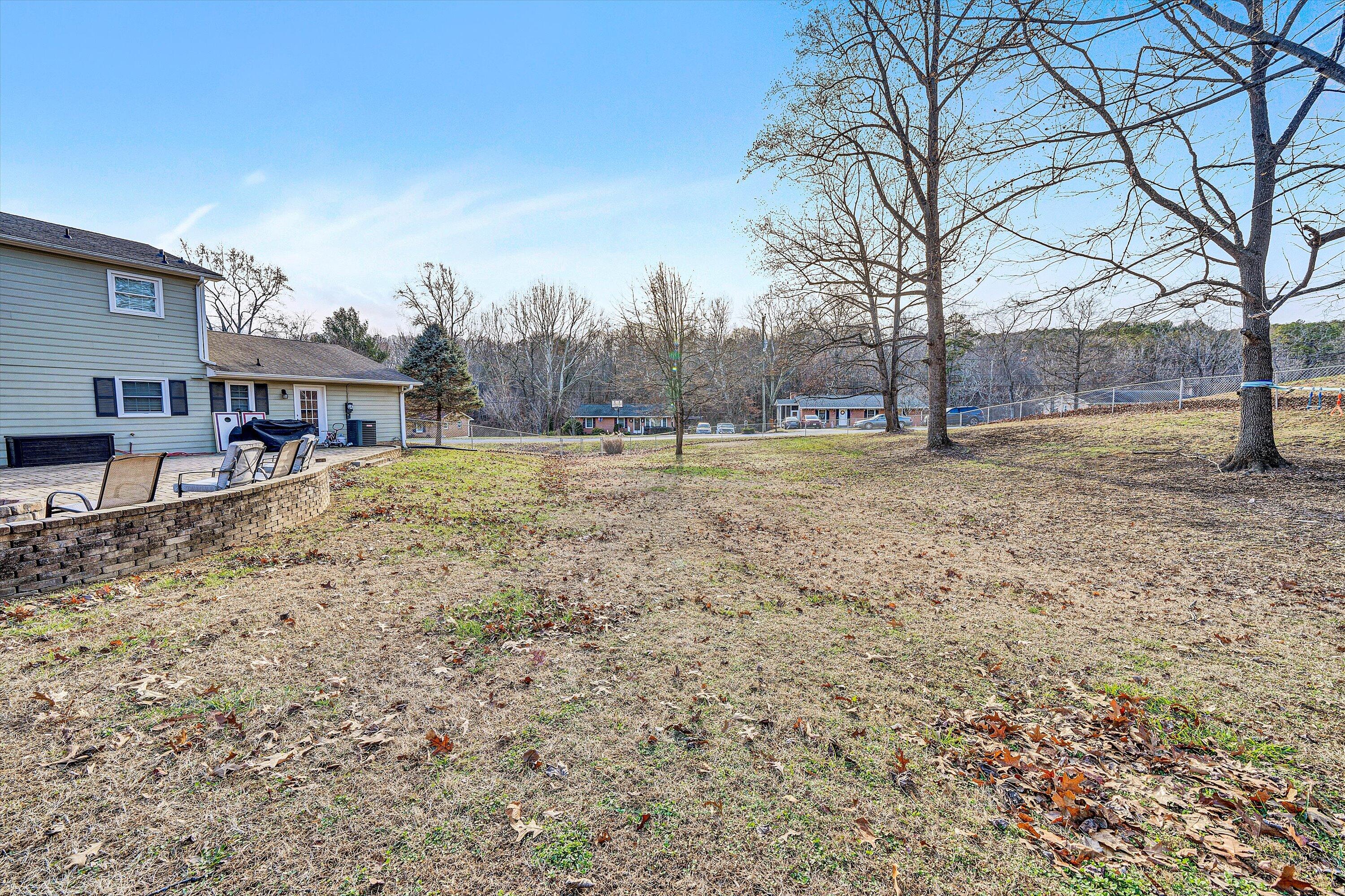 25 Charmwood Drive Blue Ridge, VA 24064 - Photo 31 of 35 a view of a yard with a house in the background