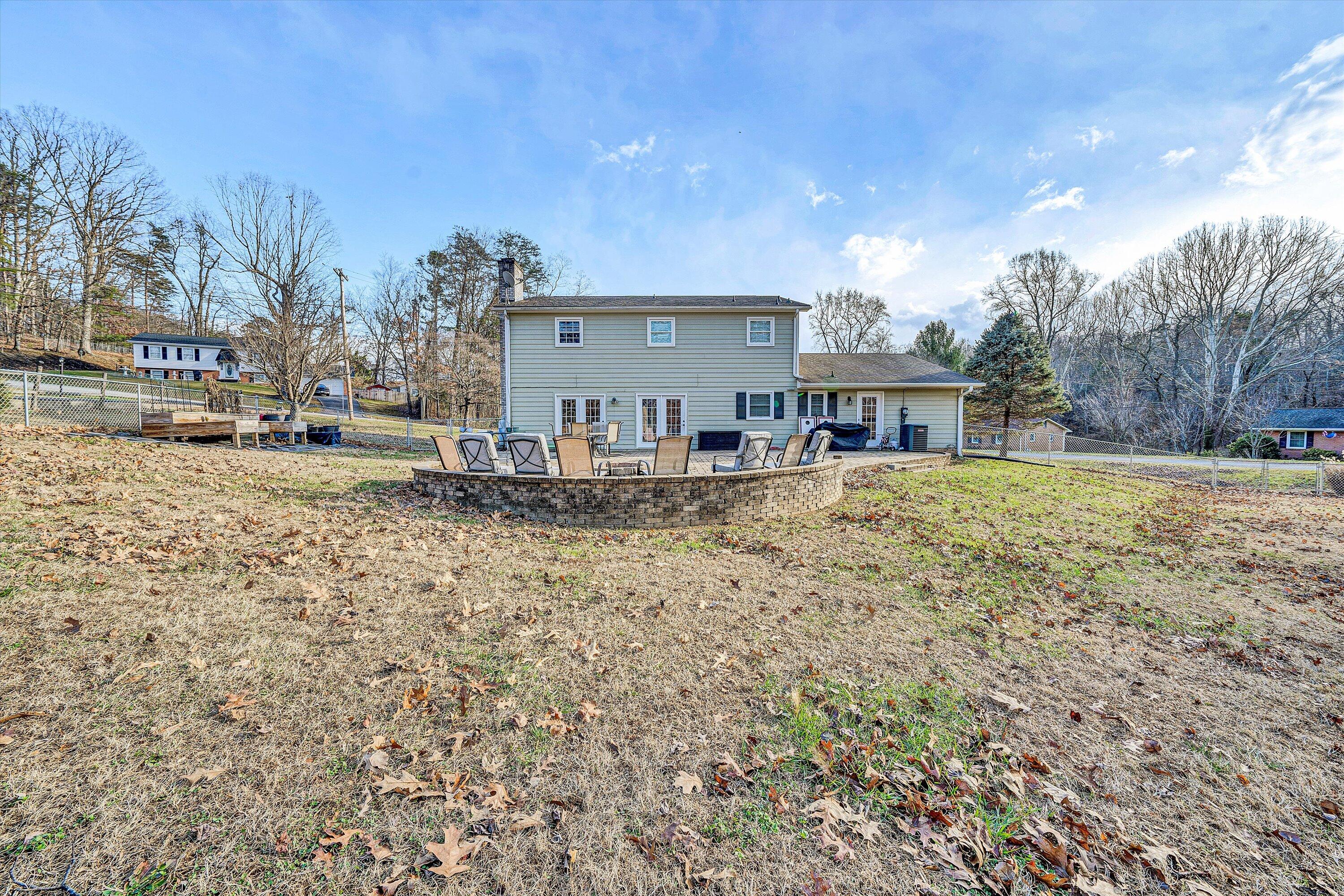 25 Charmwood Drive Blue Ridge, VA 24064 - Photo 32 of 35 a view of a house with a yard and sitting area