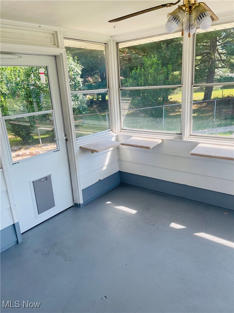 2557 Mayfair Road Akron, OH 44312 - Photo 10 of 39 3 Season Sunroom with glass windows 3 sides.