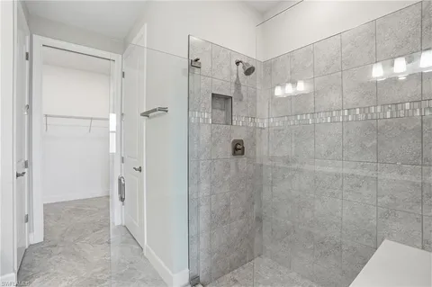 a bathroom with a double vanity sink mirror and next