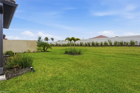 a view of a house with a big yard