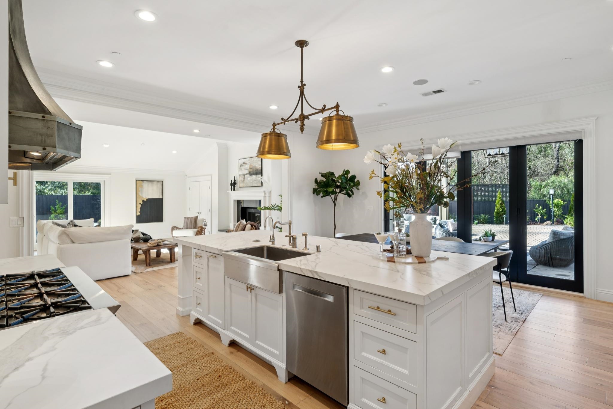 3957 Rancho Road Lafayette, CA 94549 - Photo 60 of 60 Kitchen with plenty of natural light, hanging light fixtures, open floor plan, dishwasher, and crown molding