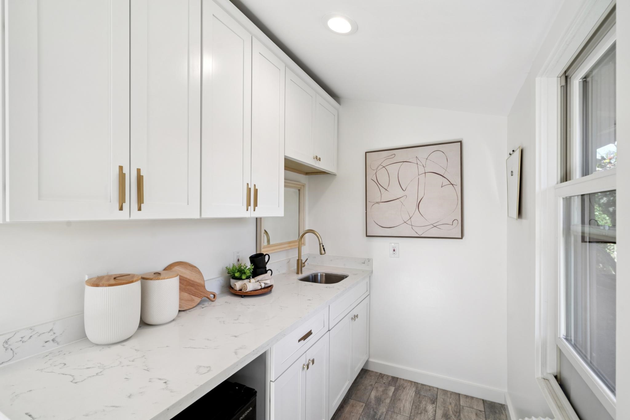 3957 Rancho Road Lafayette, CA 94549 - Photo 50 of 60 Laundry room with dark wood finished floors and recessed lighting