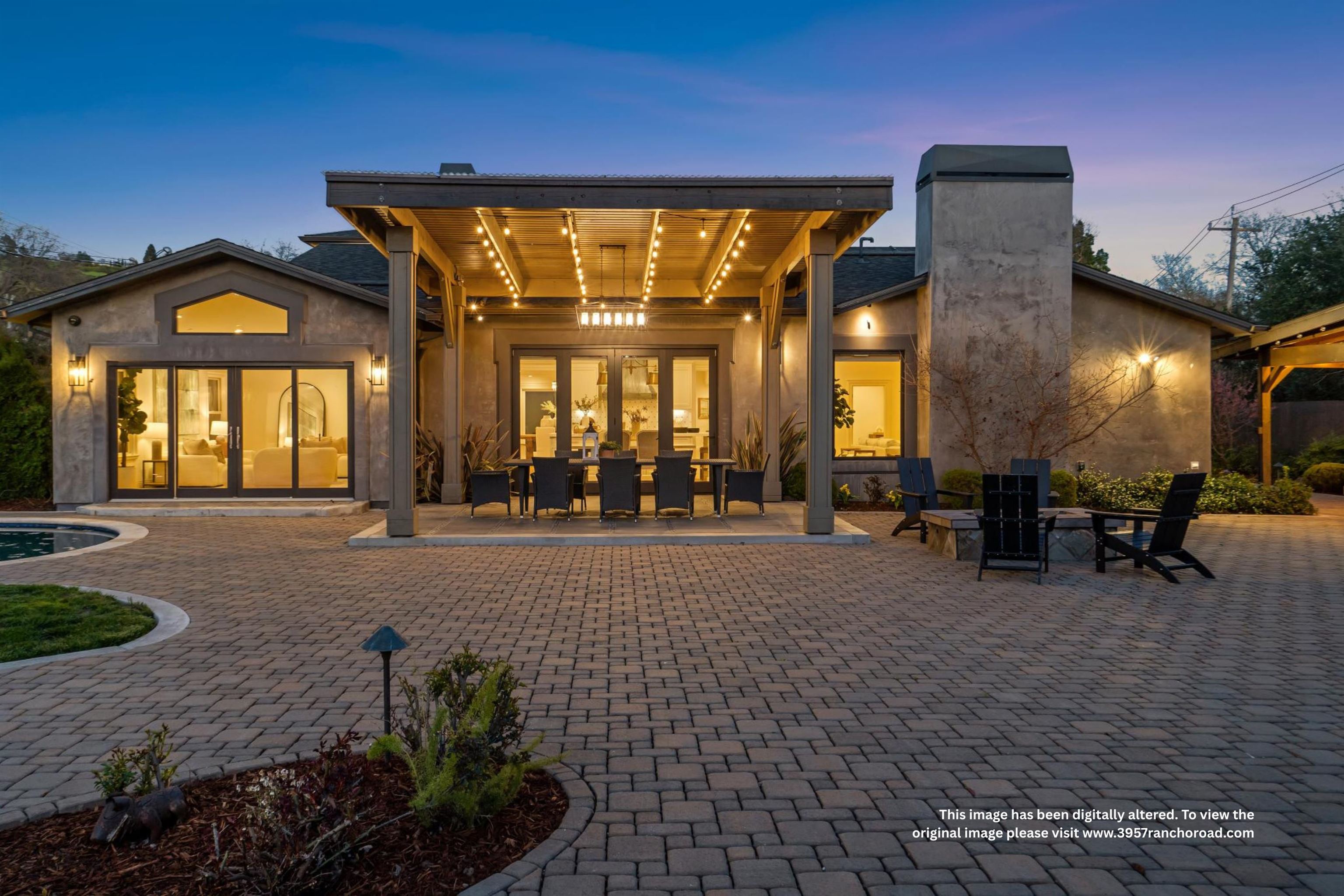 3957 Rancho Road Lafayette, CA 94549 - Photo 54 of 60 Back of house at dusk with a patio area, a chimney, and stucco siding
