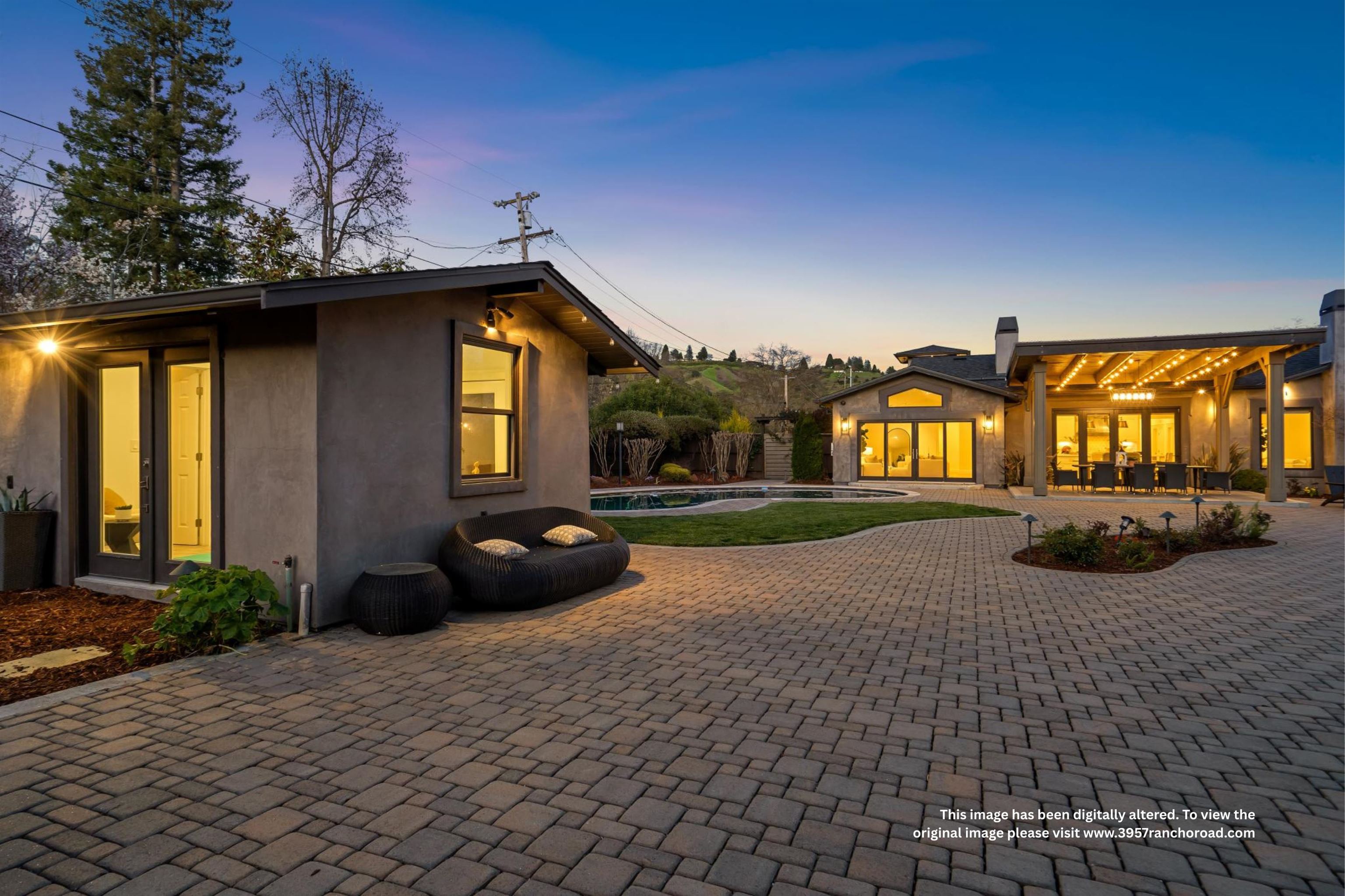 3957 Rancho Road Lafayette, CA 94549 - Photo 59 of 60 Rear view of property with a patio area, stucco siding, an outdoor pool, and driveway