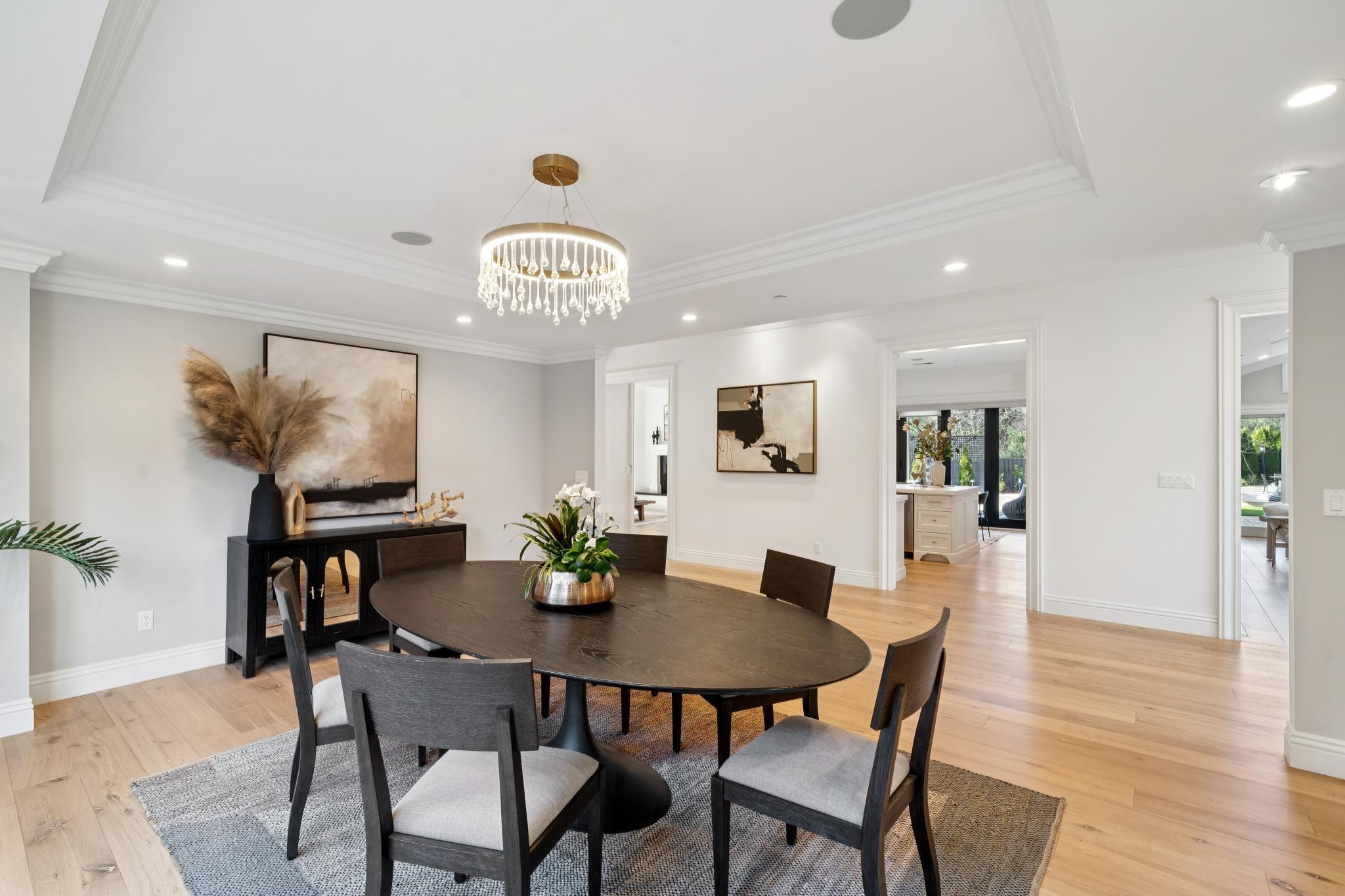 3957 Rancho Road Lafayette, CA 94549 - Photo 9 of 60 Dining room with light wood finished floors, recessed lighting, a chandelier, a tray ceiling, and ornamental molding