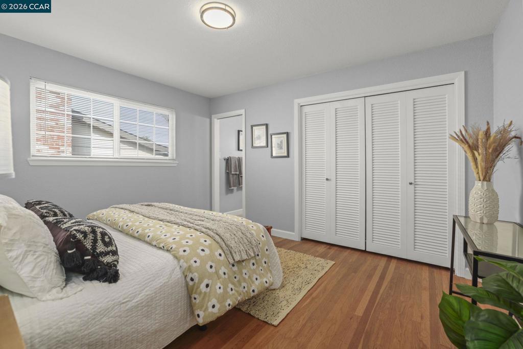3613-3613 Longview Road Antioch, CA 94509 - Photo 22 of 30 a bedroom with a bed and a window