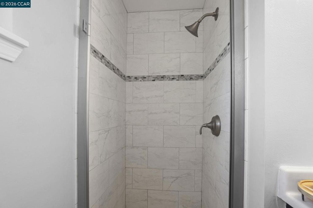 3613-3613 Longview Road Antioch, CA 94509 - Photo 24 of 30 a bathroom with a shower and toilet