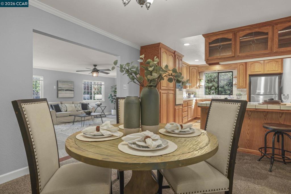 3613-3613 Longview Road Antioch, CA 94509 - Photo 9 of 30 a view of a dining room with furniture window and wooden floor