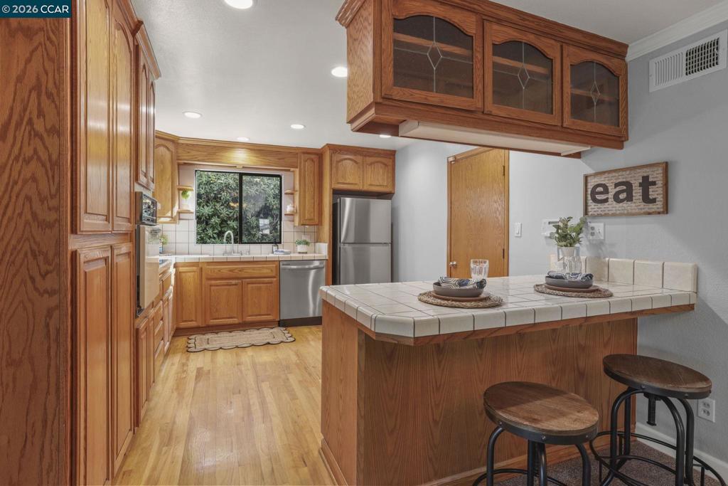 3613-3613 Longview Road Antioch, CA 94509 - Photo 10 of 30 a dining room with a table and chairs