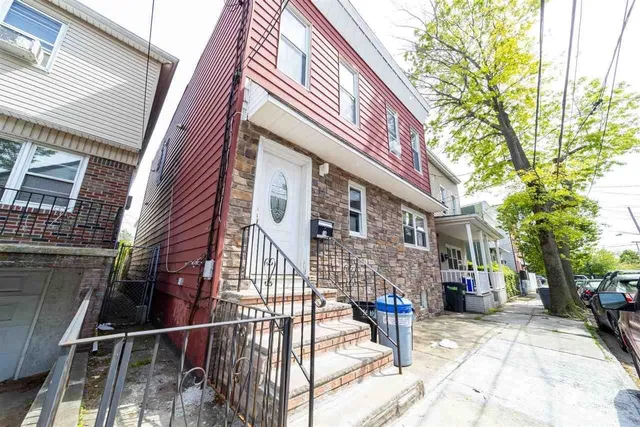 a view of a house with a patio