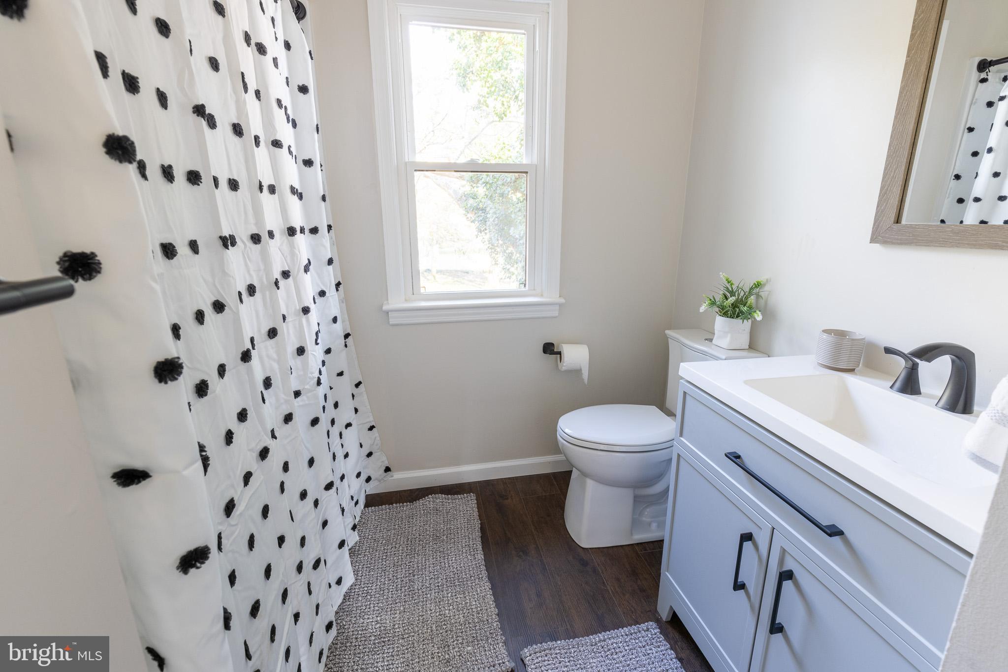 85 Homeland Road York, PA 17403 - Photo 12 of 26 a bathroom with a sink and a toilet