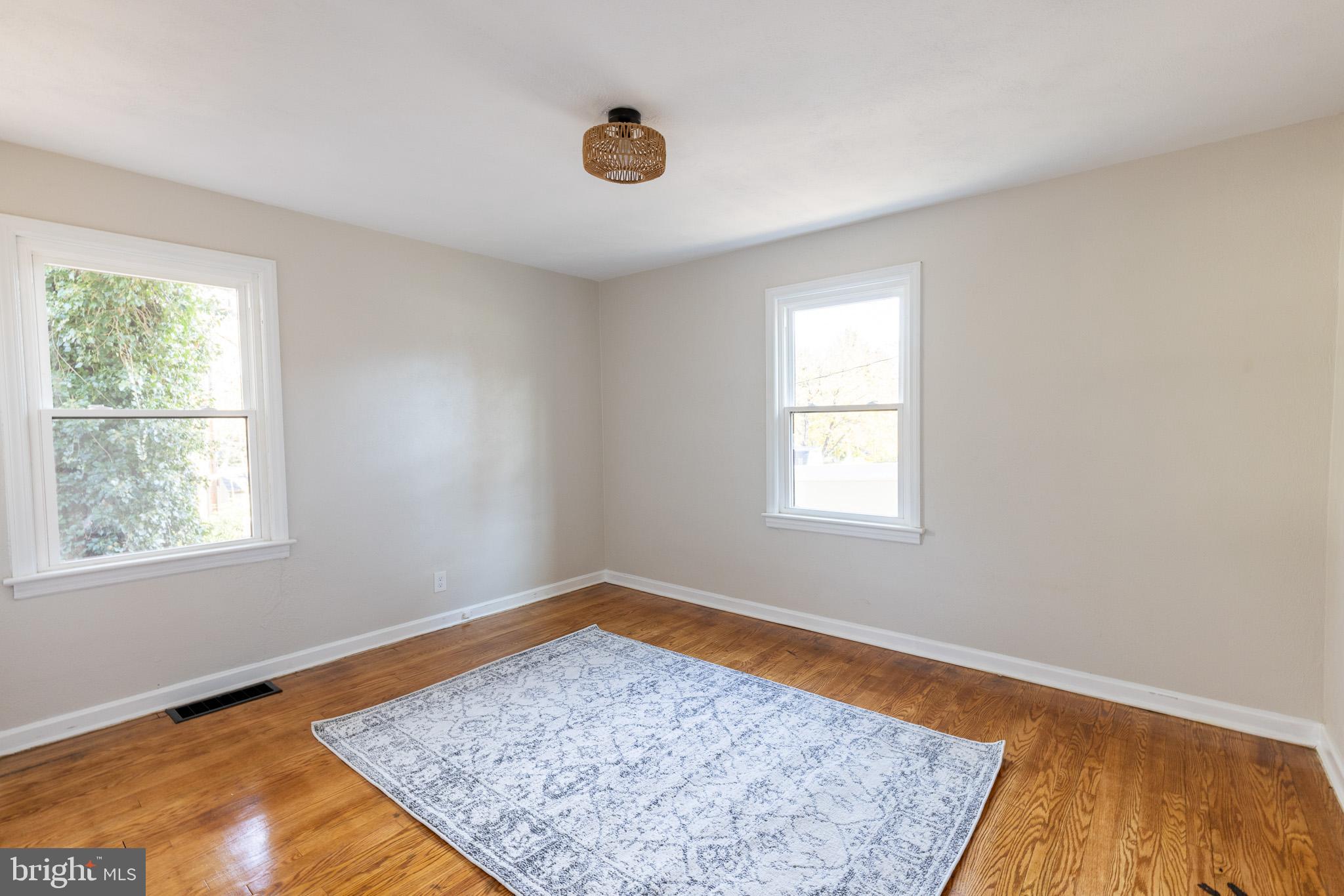 85 Homeland Road York, PA 17403 - Photo 13 of 26 a view of a room with wooden floor and window