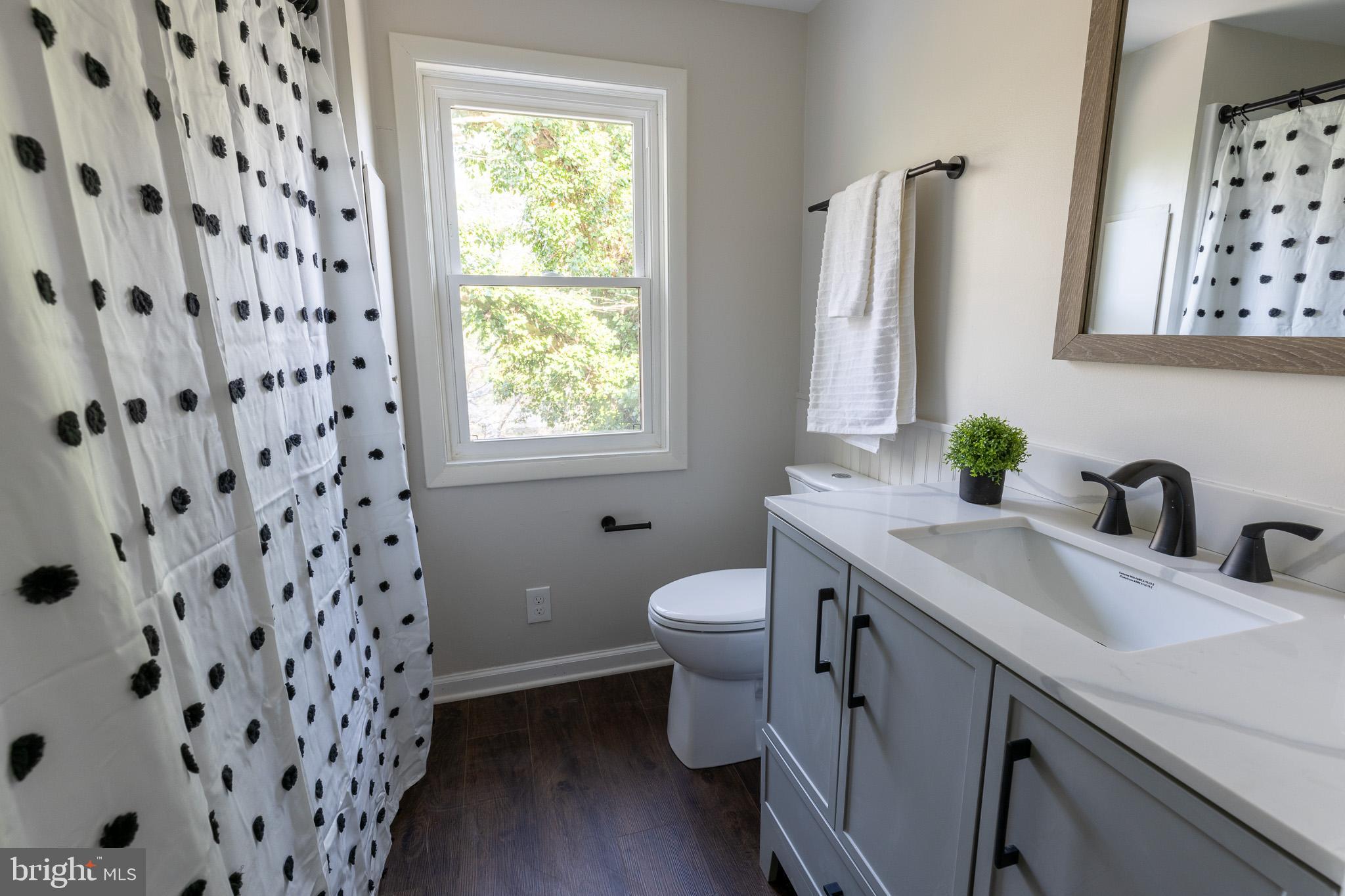 85 Homeland Road York, PA 17403 - Photo 19 of 26 a bathroom with a sink and a toilet