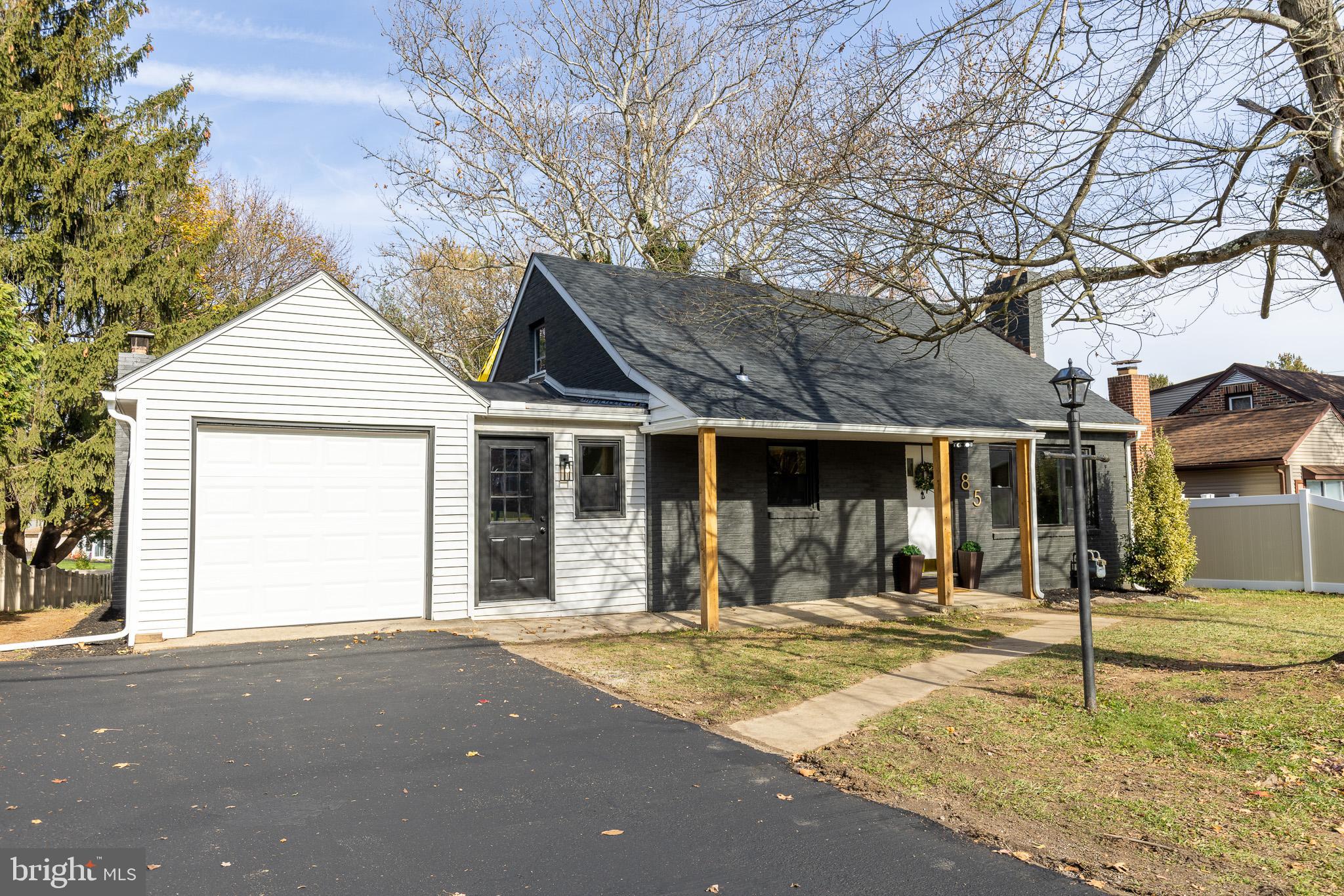 85 Homeland Road York, PA 17403 - Photo 2 of 26 a front view of a house with a yard