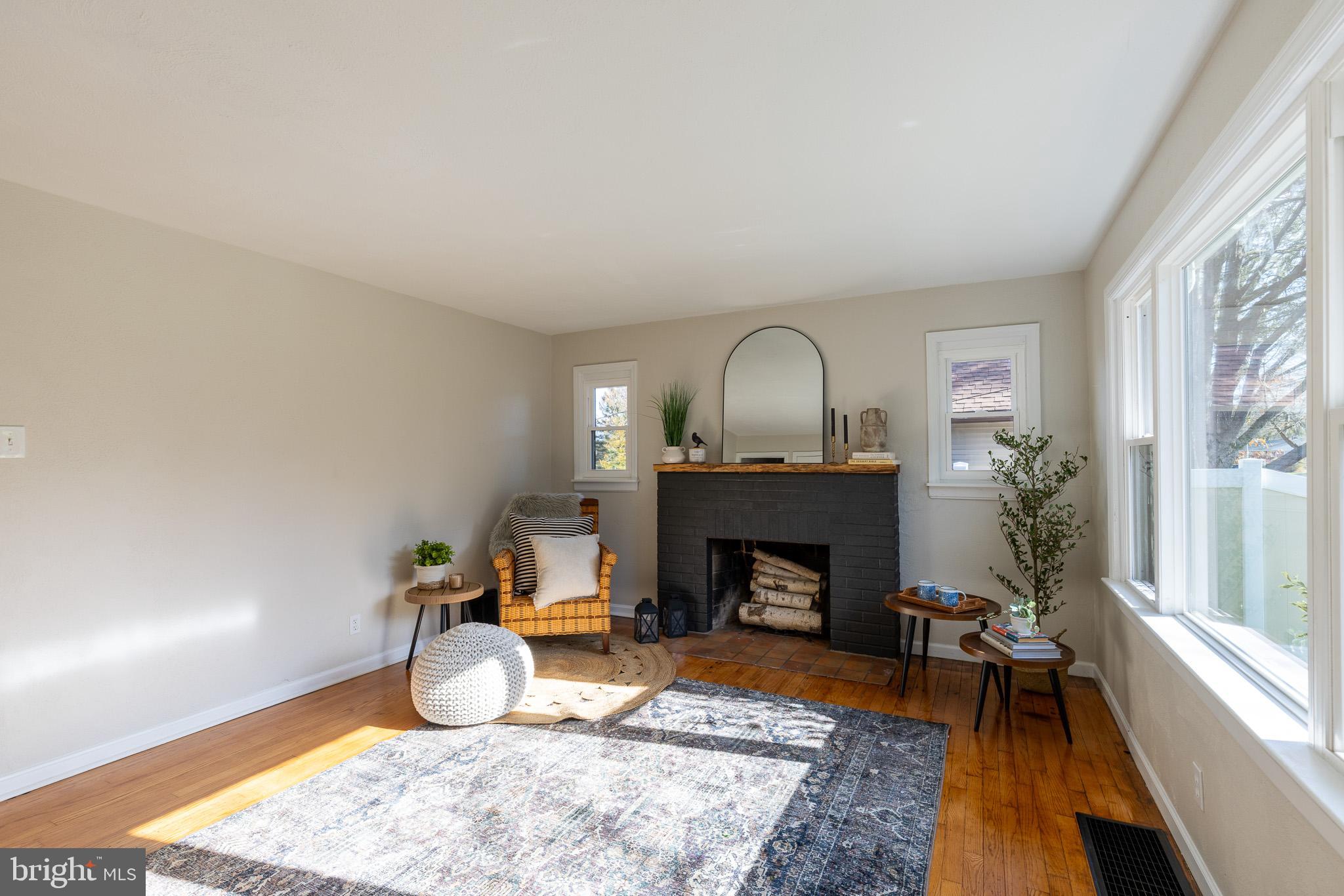 85 Homeland Road York, PA 17403 - Photo 4 of 26 a living room with furniture and a fireplace