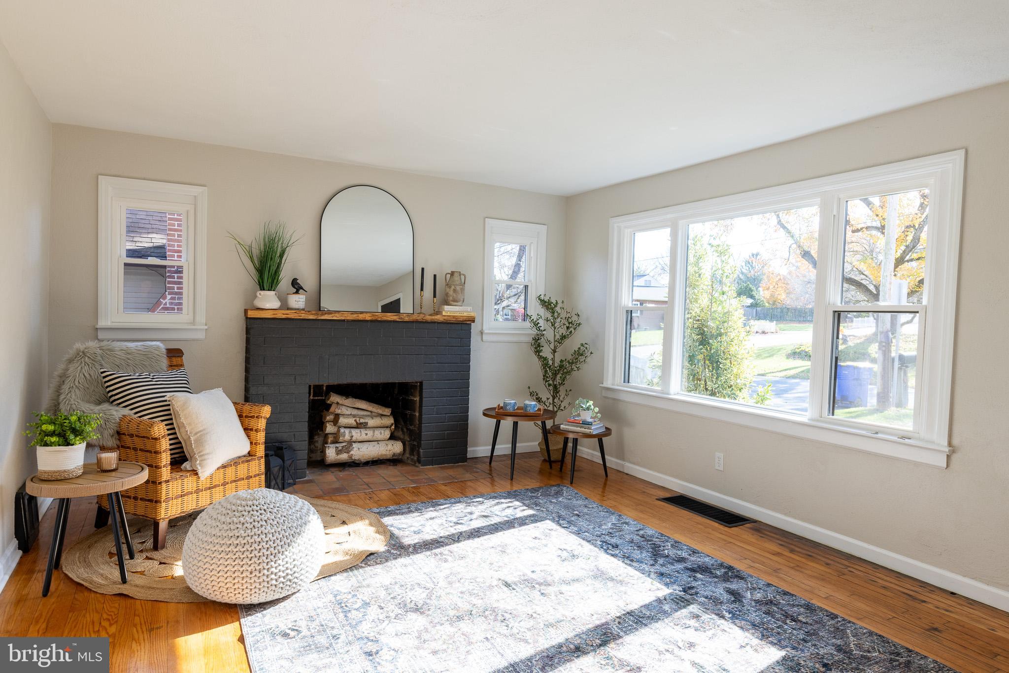 85 Homeland Road York, PA 17403 - Photo 5 of 26 a living room with furniture and a fireplace