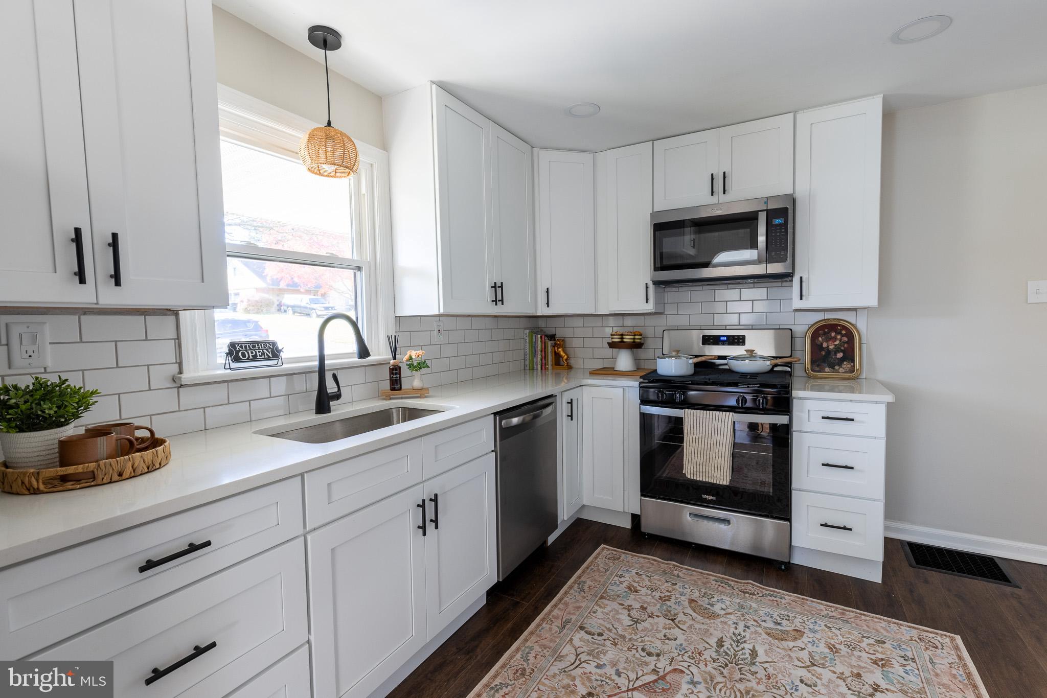 85 Homeland Road York, PA 17403 - Photo 6 of 26 a kitchen with appliances a sink and cabinets