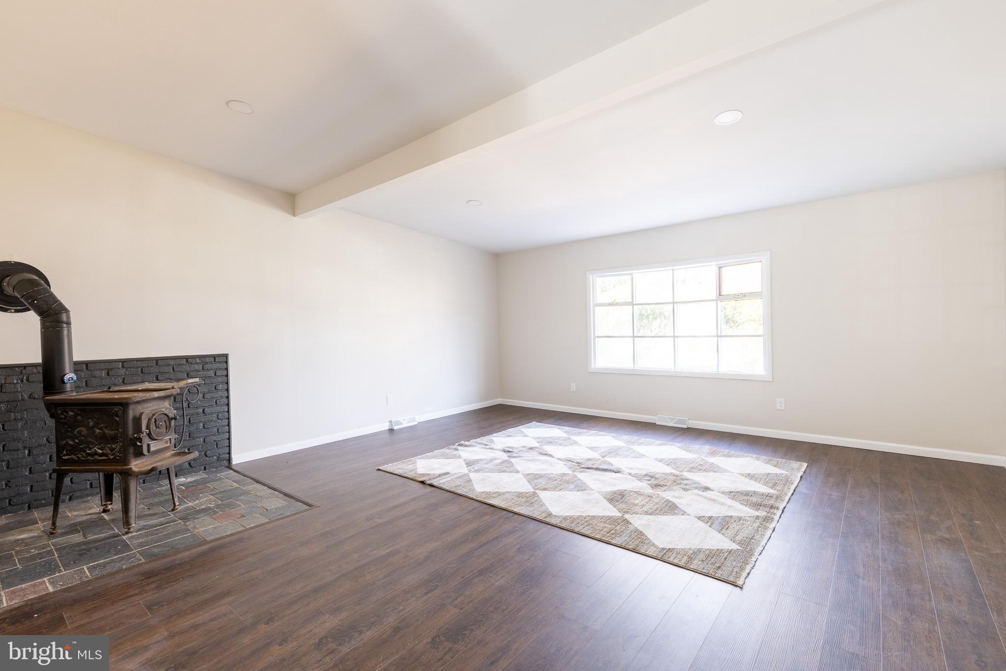 85 Homeland Road York, PA 17403 - Photo 9 of 26 a view of a livingroom with wooden floor and furniture