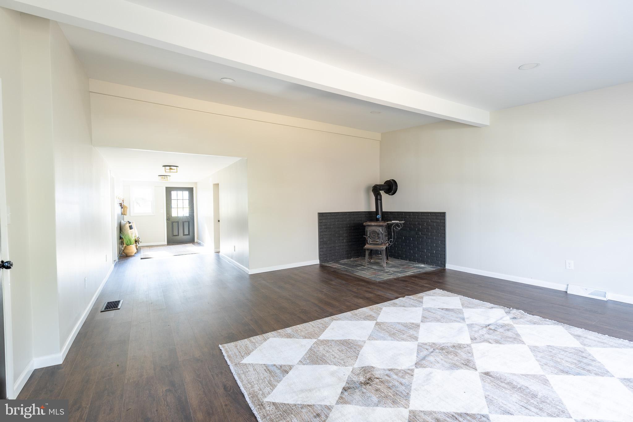 85 Homeland Road York, PA 17403 - Photo 10 of 26 a view of empty room with wooden floor