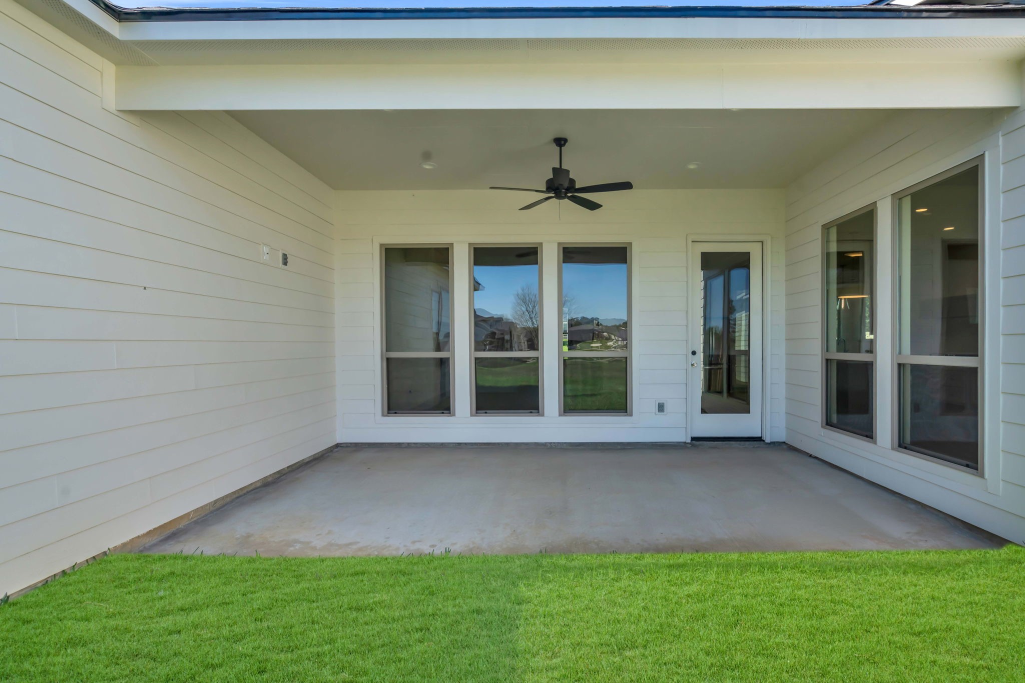 24972 Hopeview Way Montgomery, TX 77356 - Photo 33 of 38 Your back porch, shaded and comfortable to spend the afternoon on.