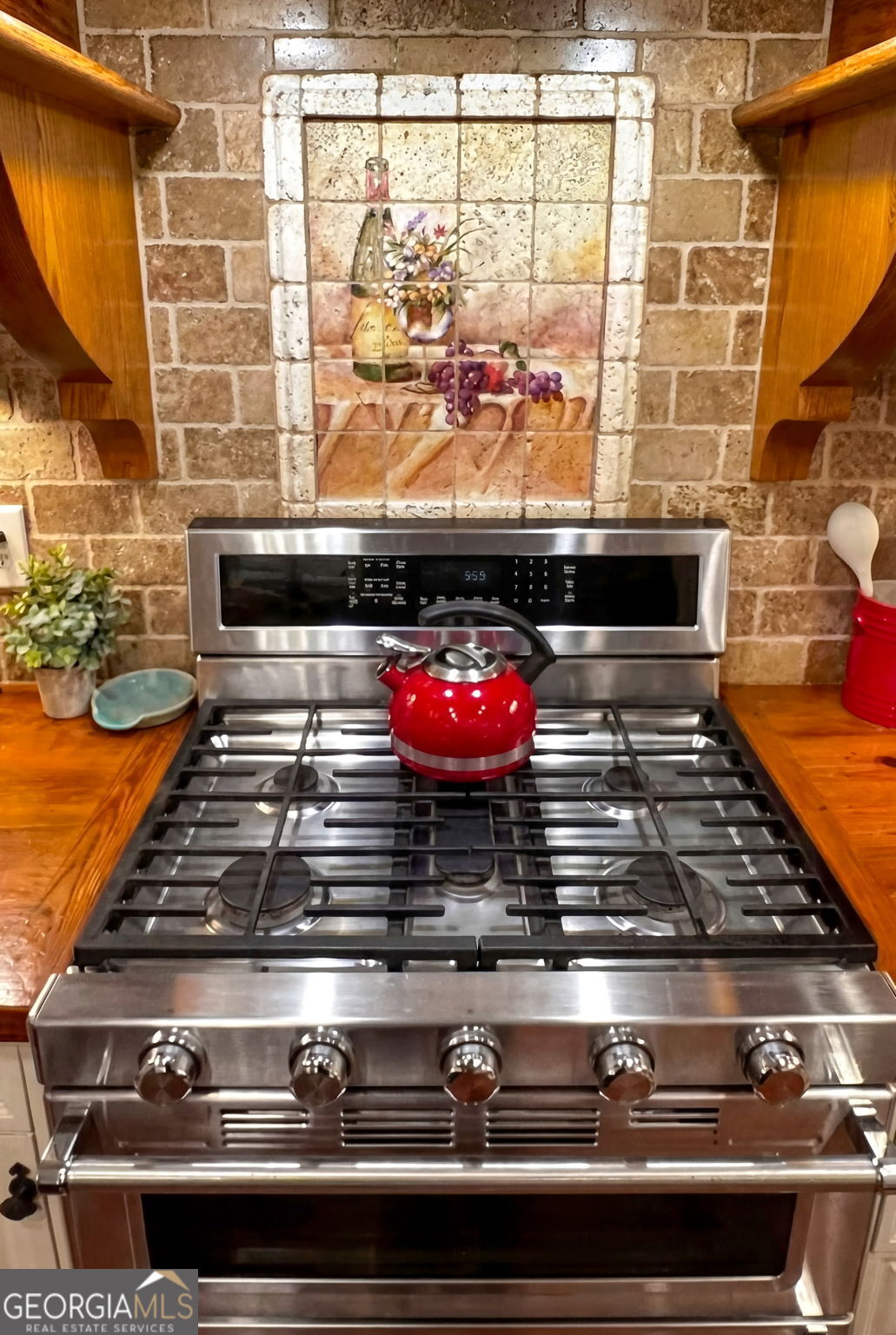 551 Carter Road Griffin, GA 30224 - Photo 20 of 86 a stove top oven sitting inside of a kitchen