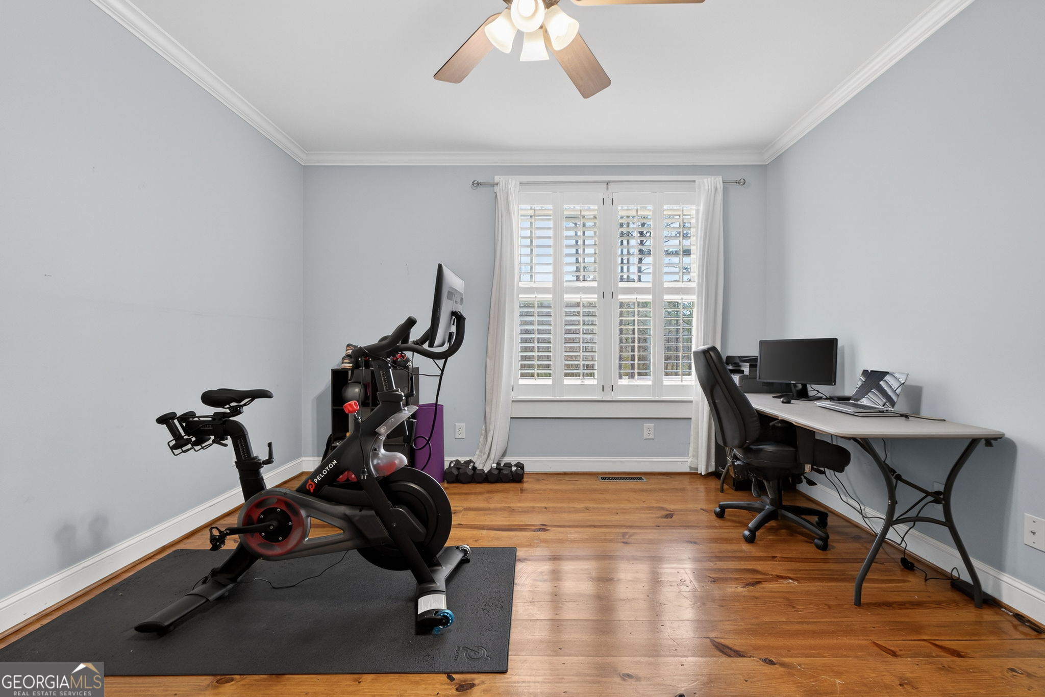 551 Carter Road Griffin, GA 30224 - Photo 42 of 86 a view of a workspace with gym equipment