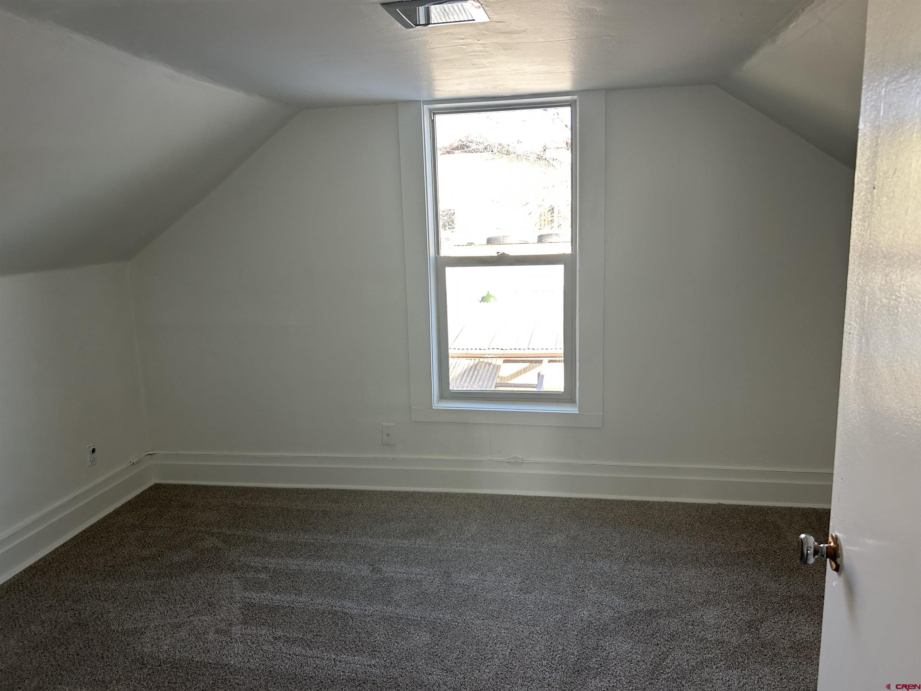 281 Fox Street Nucla, CO 81424 - Photo 17 of 21 an empty room with a window