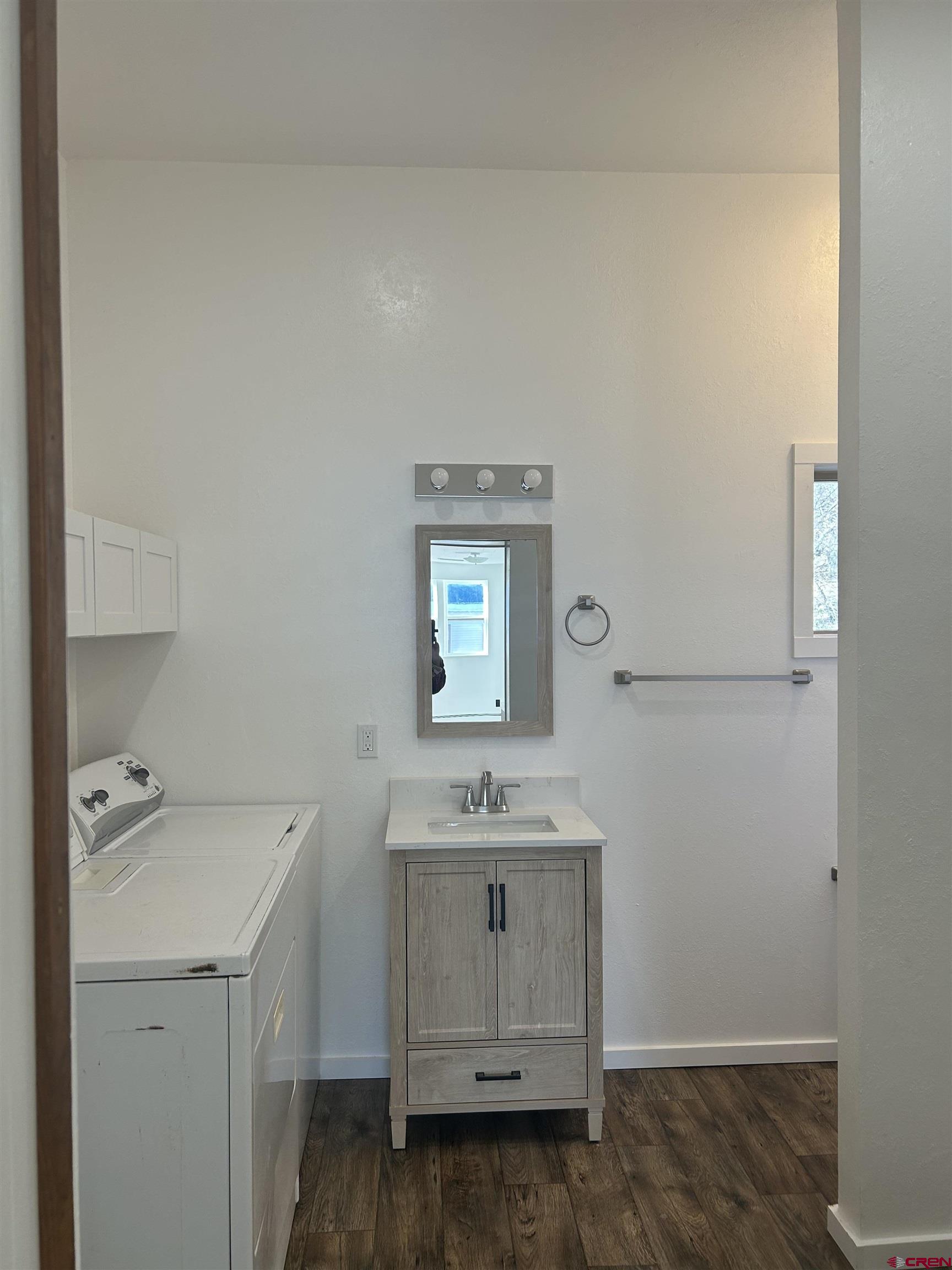 281 Fox Street Nucla, CO 81424 - Photo 18 of 21 a bathroom with a sink and a mirror