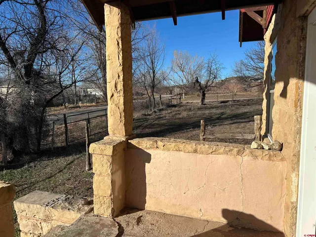 a view of a backyard of a house