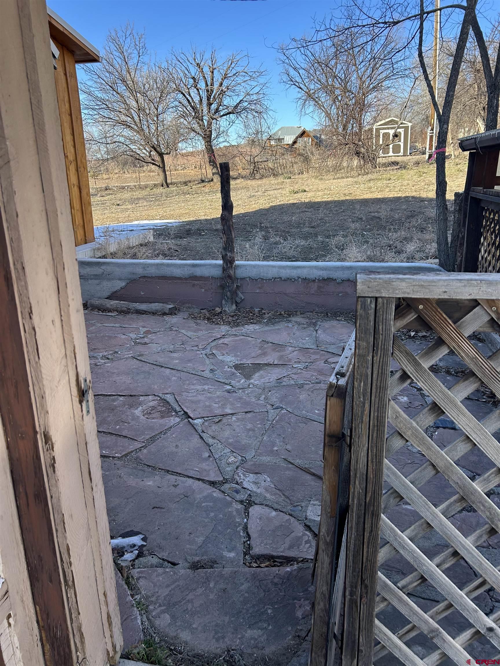 281 Fox Street Nucla, CO 81424 - Photo 6 of 21 a view of a backyard of a house