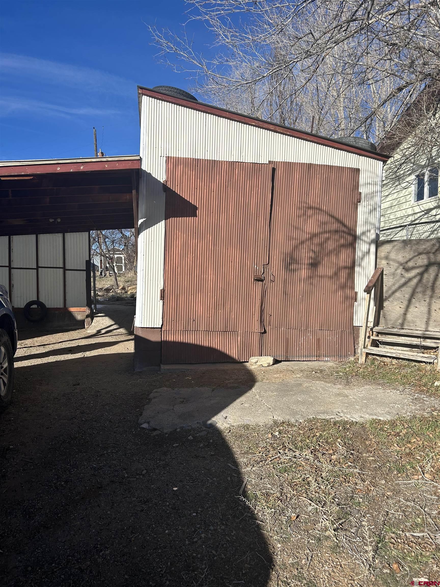 281 Fox Street Nucla, CO 81424 - Photo 7 of 21 a view of a backyard of a house