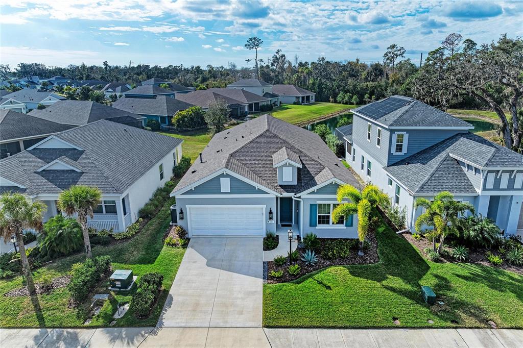 4211 Rustling Pines Terrace Parrish, FL 34219 - Photo 2 of 87 an aerial view of a house