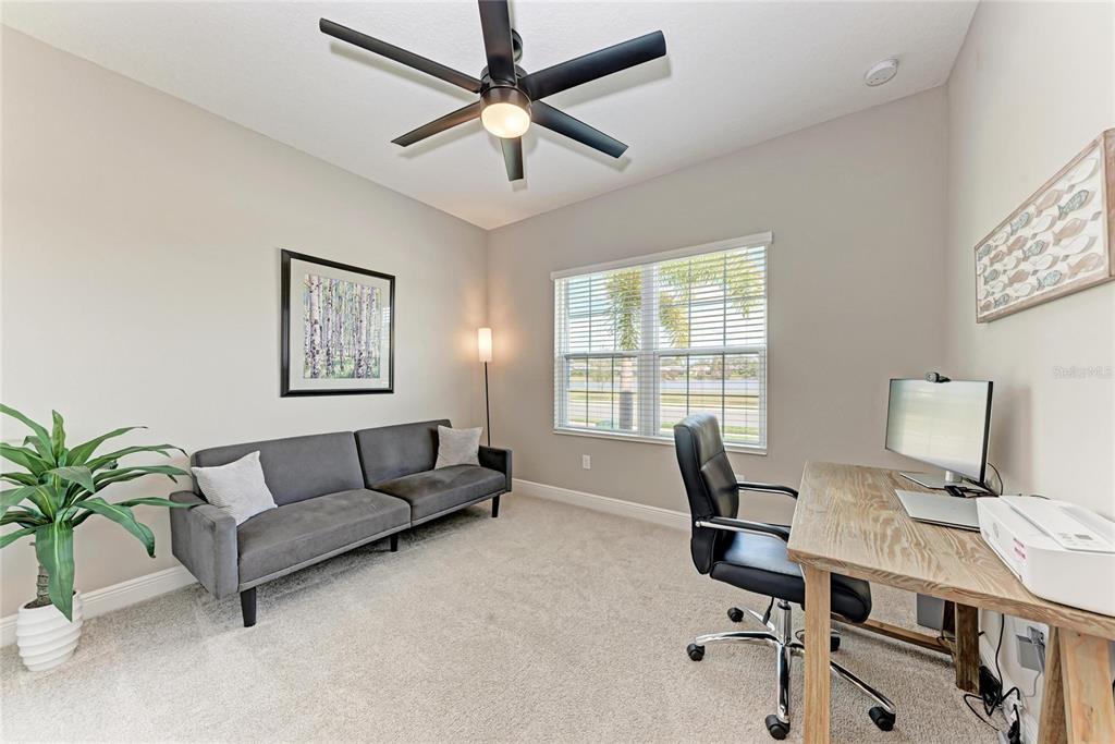 4211 Rustling Pines Terrace Parrish, FL 34219 - Photo 29 of 87 a living room with furniture