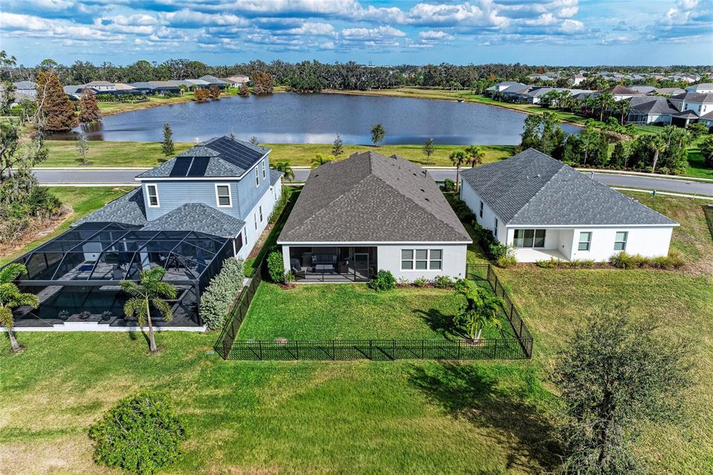 4211 Rustling Pines Terrace Parrish, FL 34219 - Photo 46 of 87 an aerial view of a house with a big yard