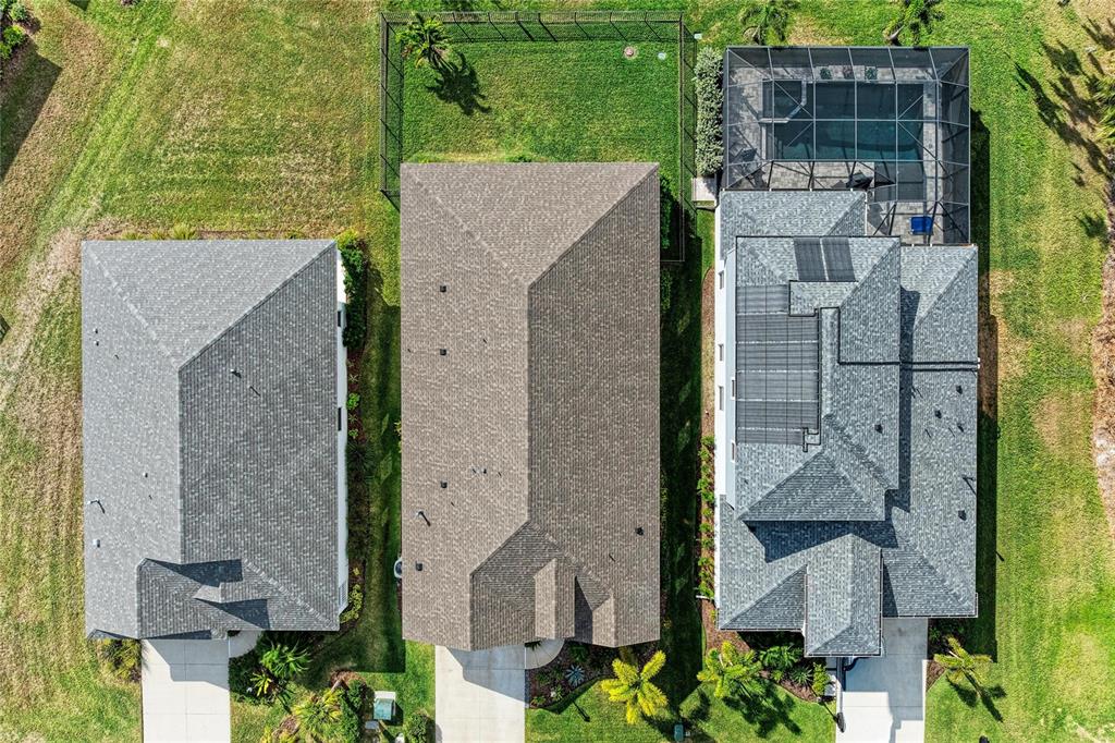 4211 Rustling Pines Terrace Parrish, FL 34219 - Photo 49 of 87 an aerial view of a residential houses with outdoor space