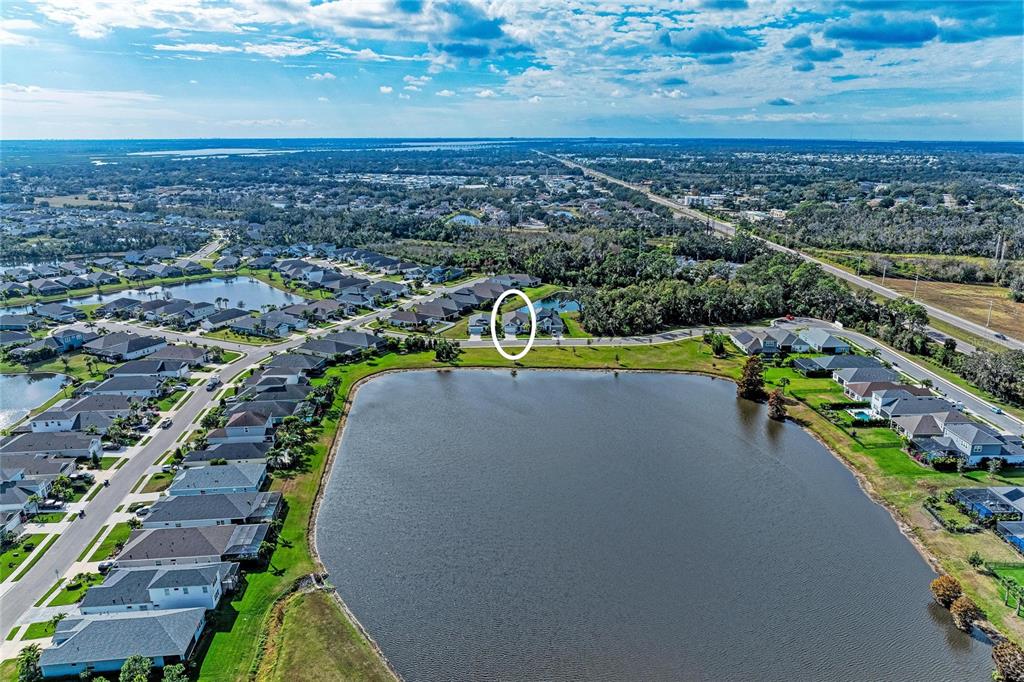 4211 Rustling Pines Terrace Parrish, FL 34219 - Photo 54 of 87 a view of a city with an ocean