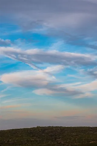a view of a city and mountains