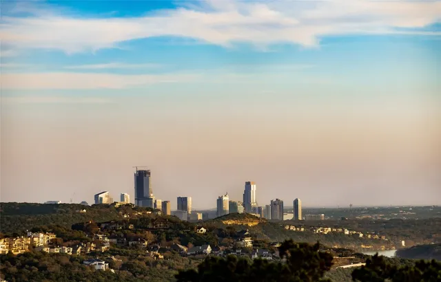 a view of a city with tall buildings