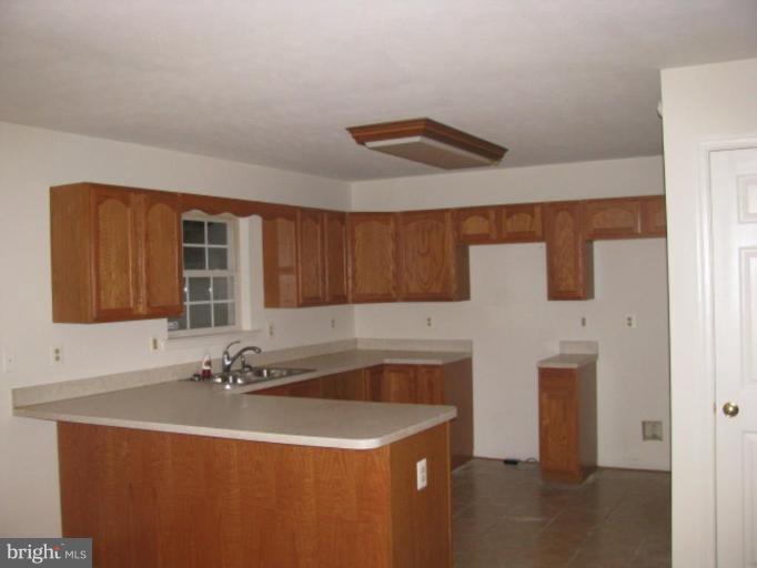 21 Drummer Hill Road Front Royal, VA 22630 - Photo 4 of 11 a bathroom with a sink and a mirror