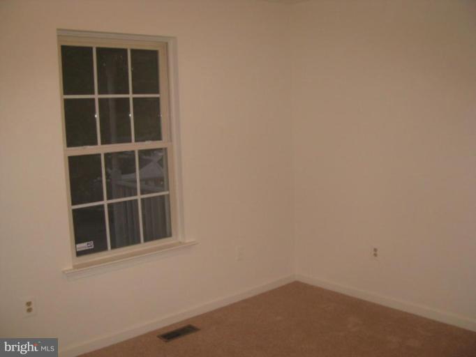 21 Drummer Hill Road Front Royal, VA 22630 - Photo 7 of 11 a view of empty room with windows